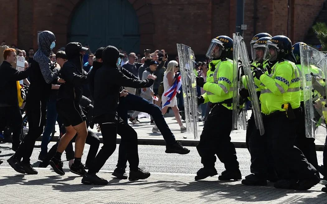 Over 90 arrested after far-right demonstrations turn violent across UK