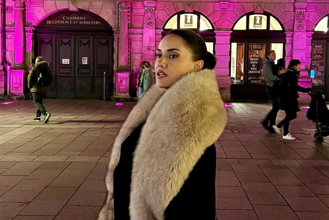 Fahriye Evcen poses wearing a cream-colored fur coat, which sparked controversy online