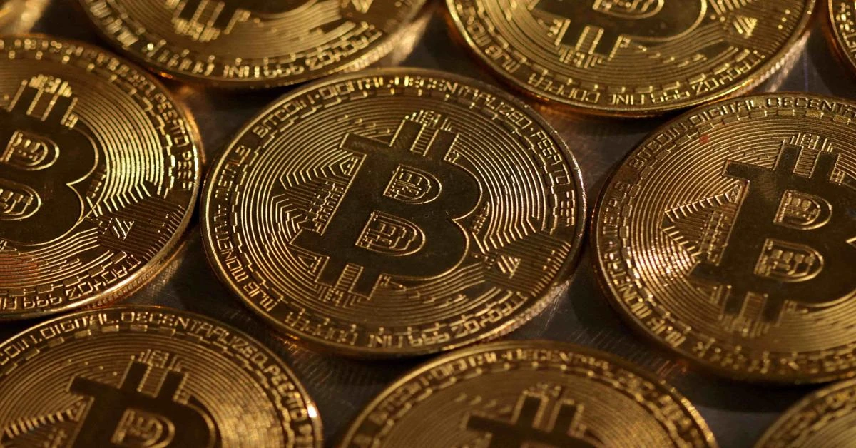 Bitcoin hits record $70,400 all-time high