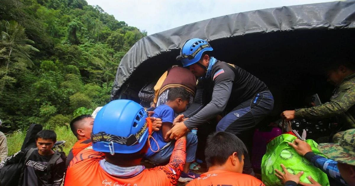 Child saved after being trapped for over 2 days in Philippines landslide