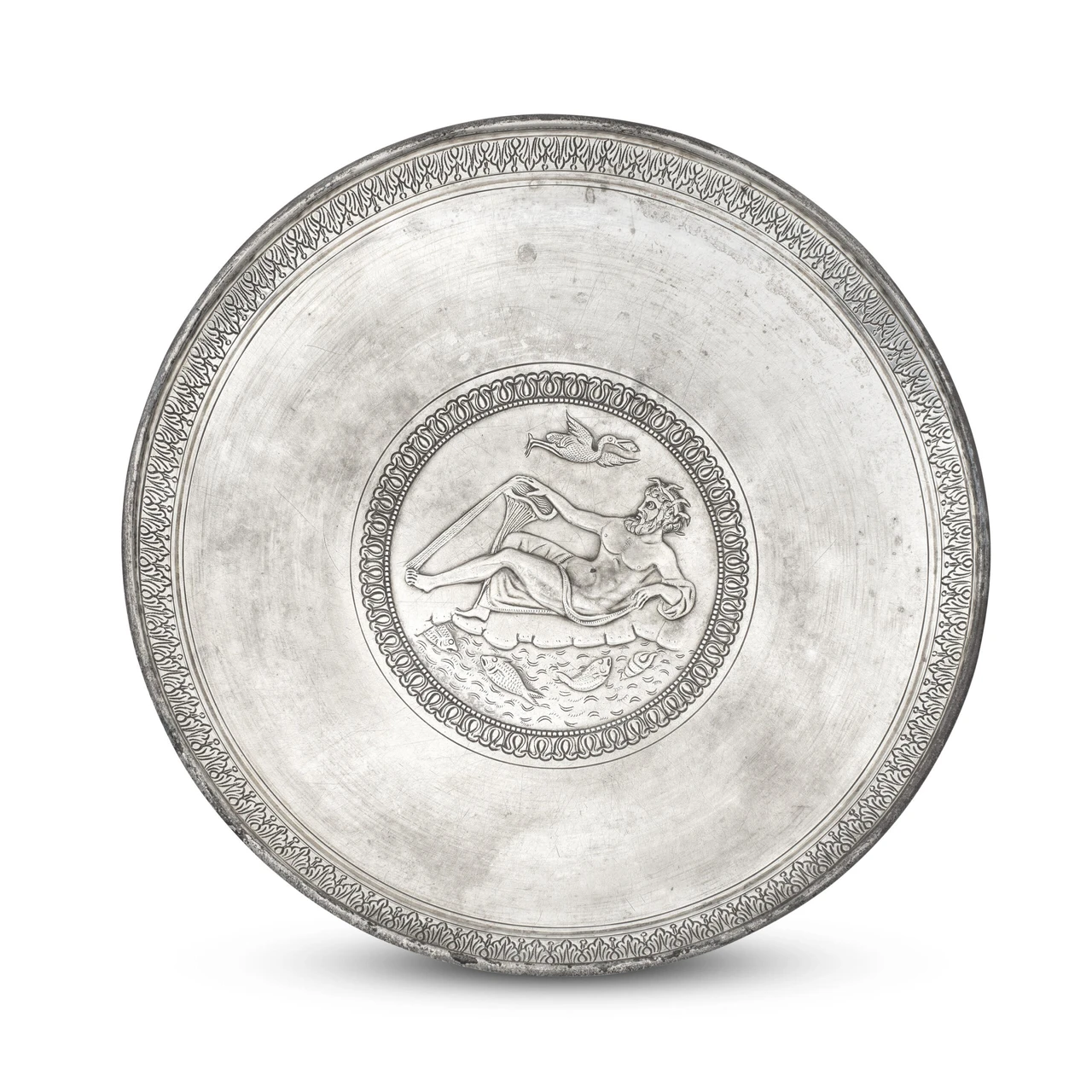 The large 3th-century Roman silver plate decorated with a River God currently auctioned by Bonhams