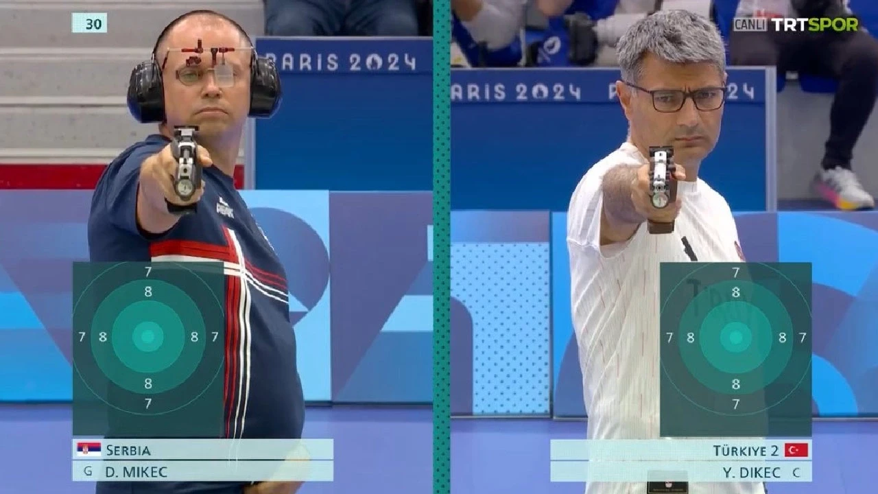 Photo shows Damir Mikec and Yusuf Dikec competing in 10m Air Pistol Mixed Team in 2024 Paris Olympics