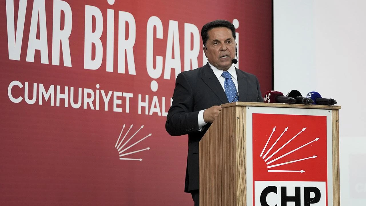 Photo shows Turkish opposition's Istanbul district mayor Ahmet Ozer arrested via PKK charges, speaking on stage