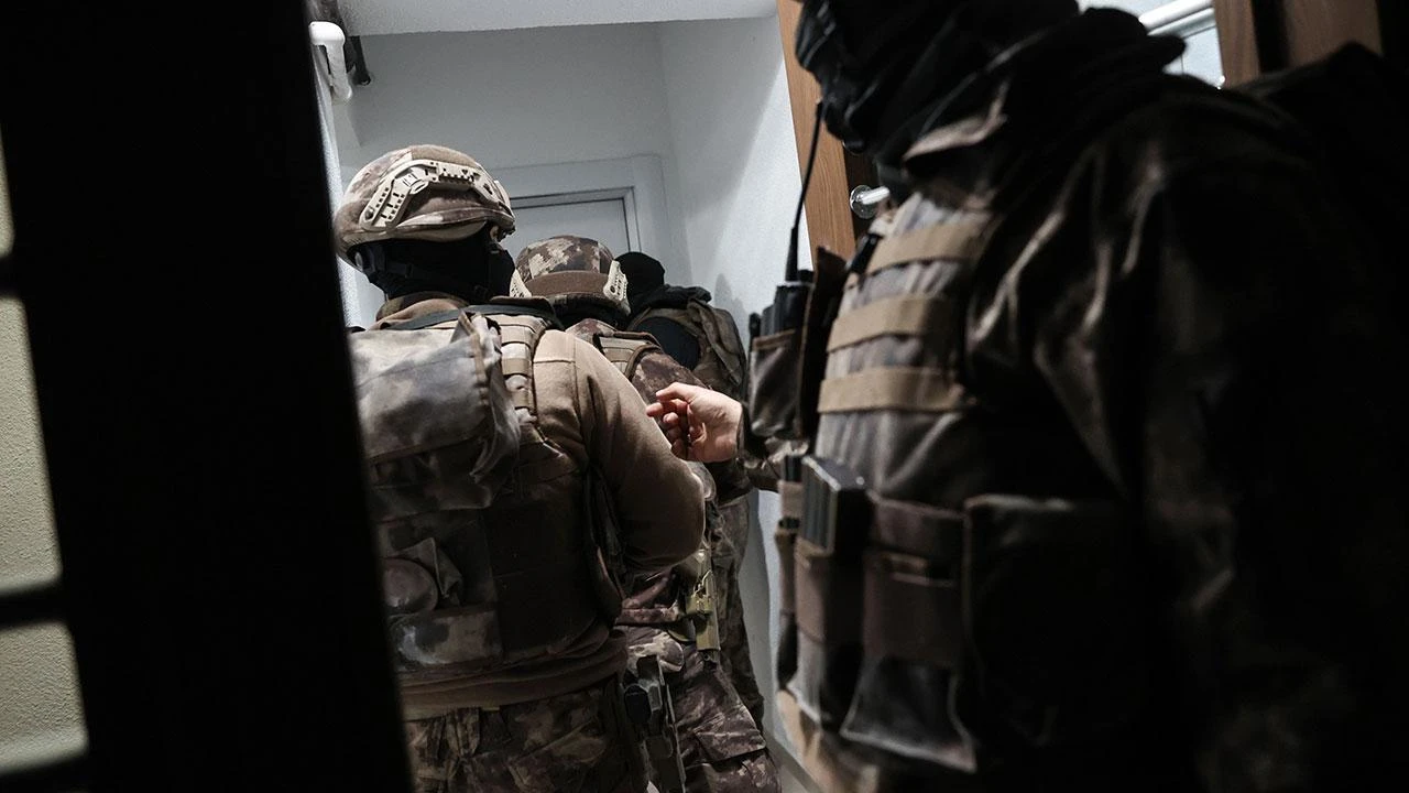 Police officers standing during operation