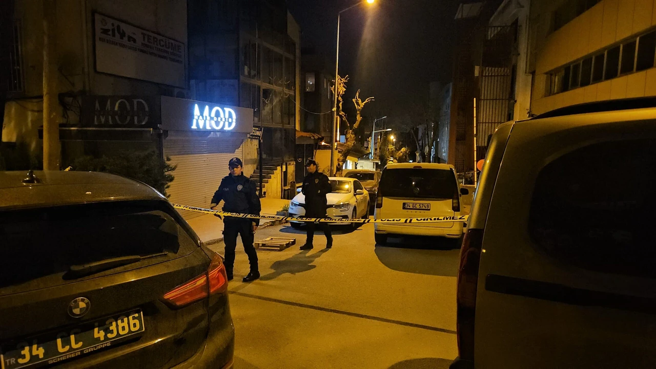 Photo shows Turkish police officers investigating a crime scene.