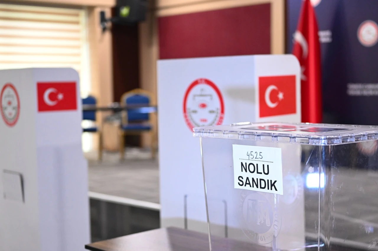 A transparent ballot box at a representative polling station