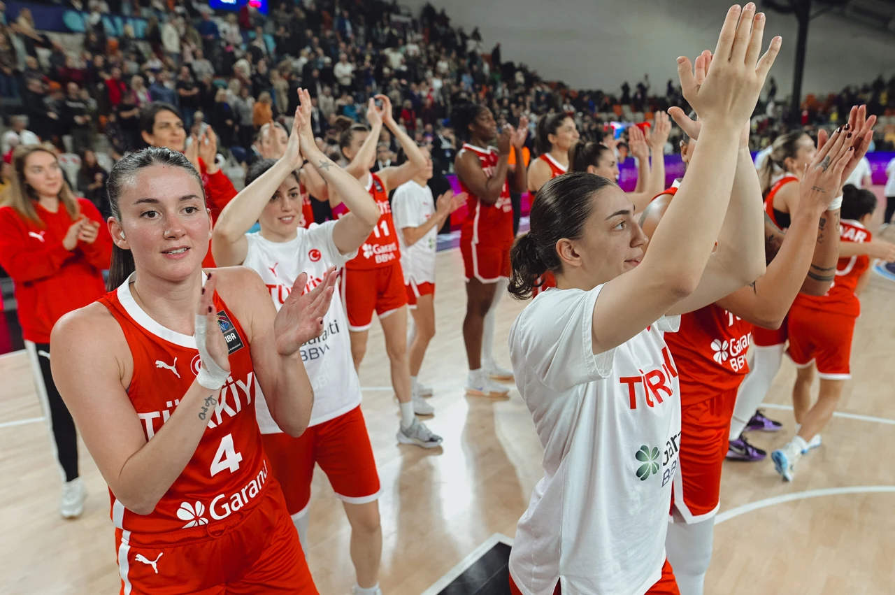 The Turkish women’s basketball team celebrates their victory over Slovakia, securing their EuroBasket 2025 spot