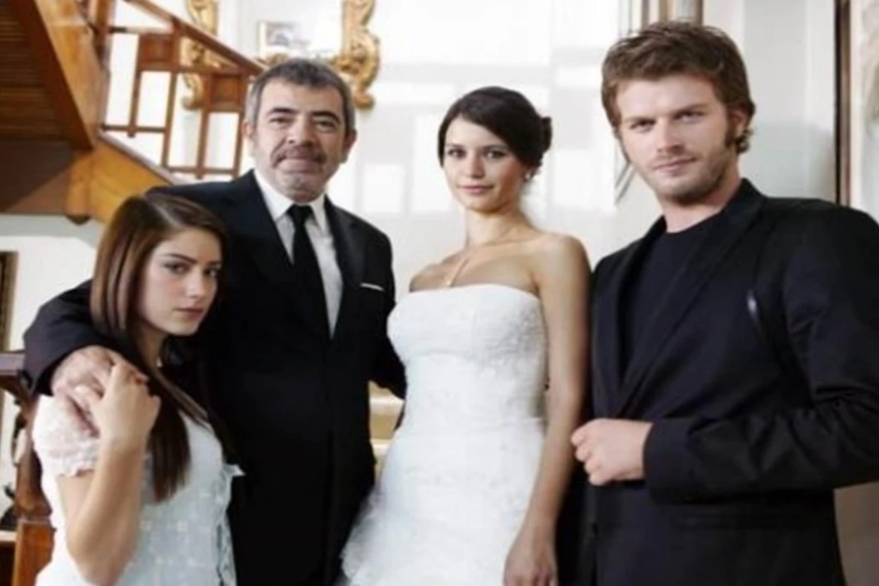A screenshot from the Turkish series Forbidden Love, depicting Bihter and Behlül in a moment of intimacy