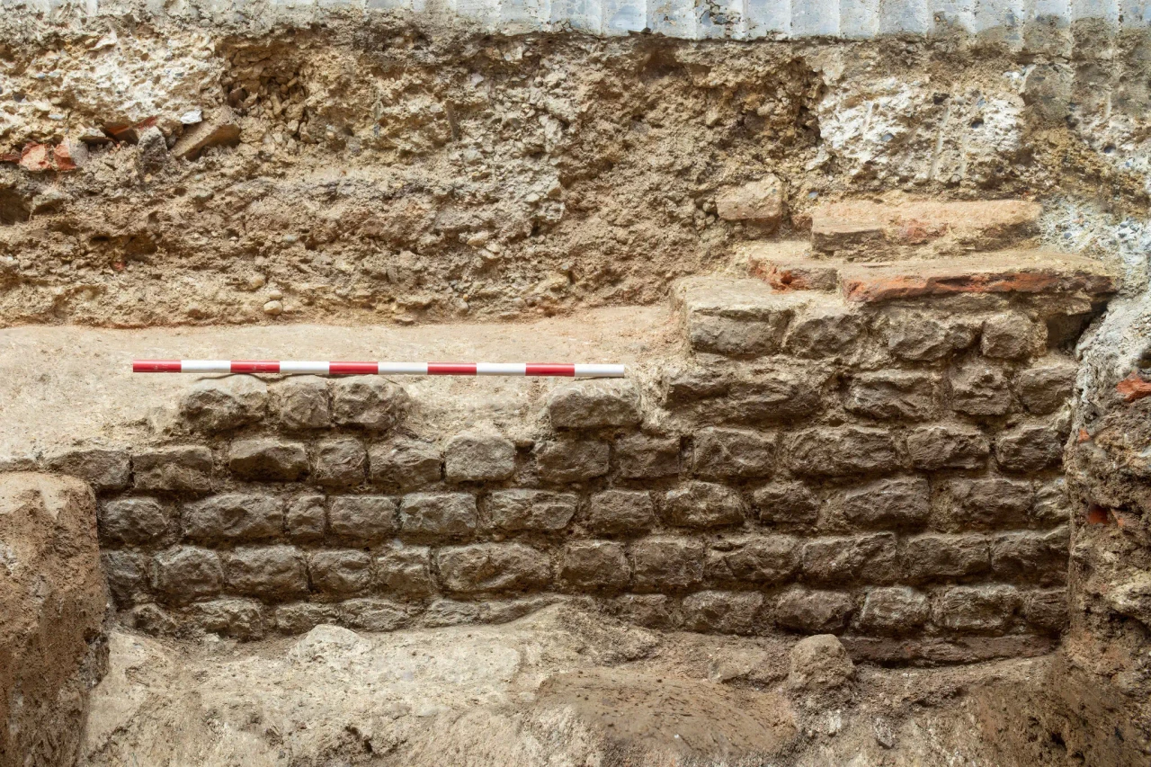 A preserved section of a Roman Basilica wall, showcasing ancient masonry.