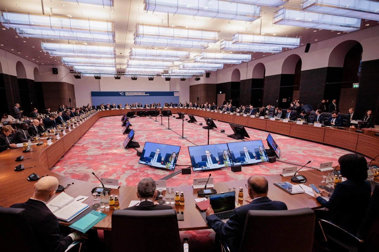 A large conference room with a circular table