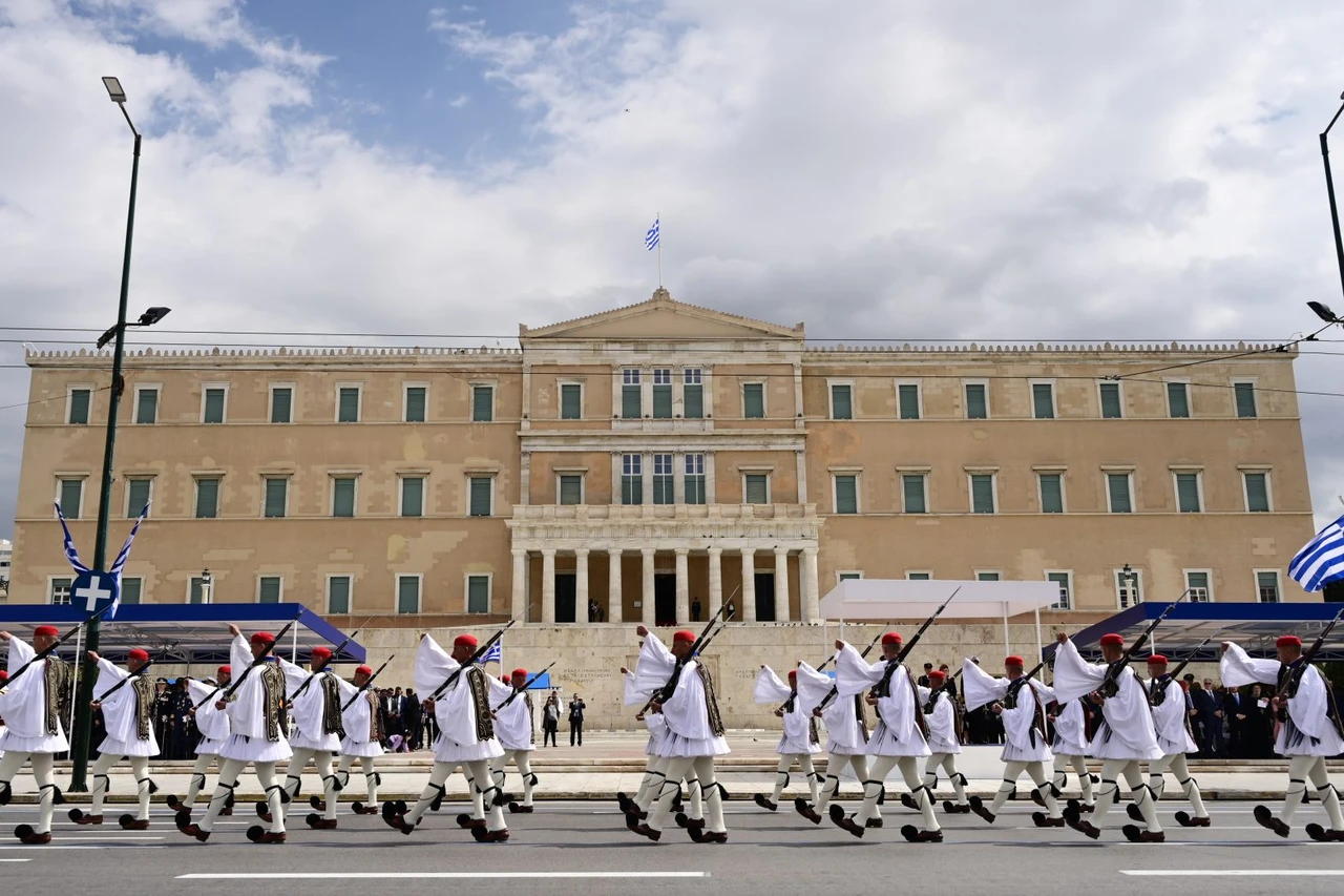 Photo shows a military parade.