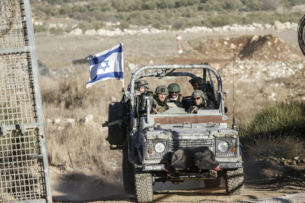 Photo shows Israeli military vehicles patrolling the Syrian-Israeli border in the Majdal Shams area of the Golan Height