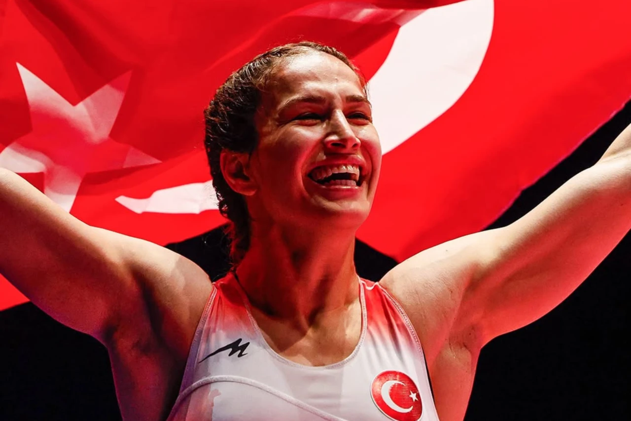 Buse Tosun Cavusoglu celebrates her bronze medal in the women's 68 kg freestyle wrestling competition at the Paris 2024