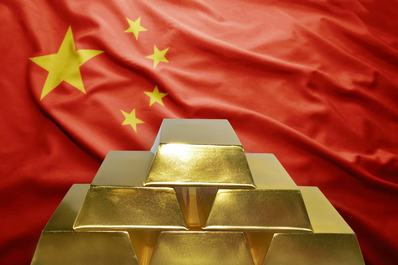 shining golden bullions on the chinese flag background