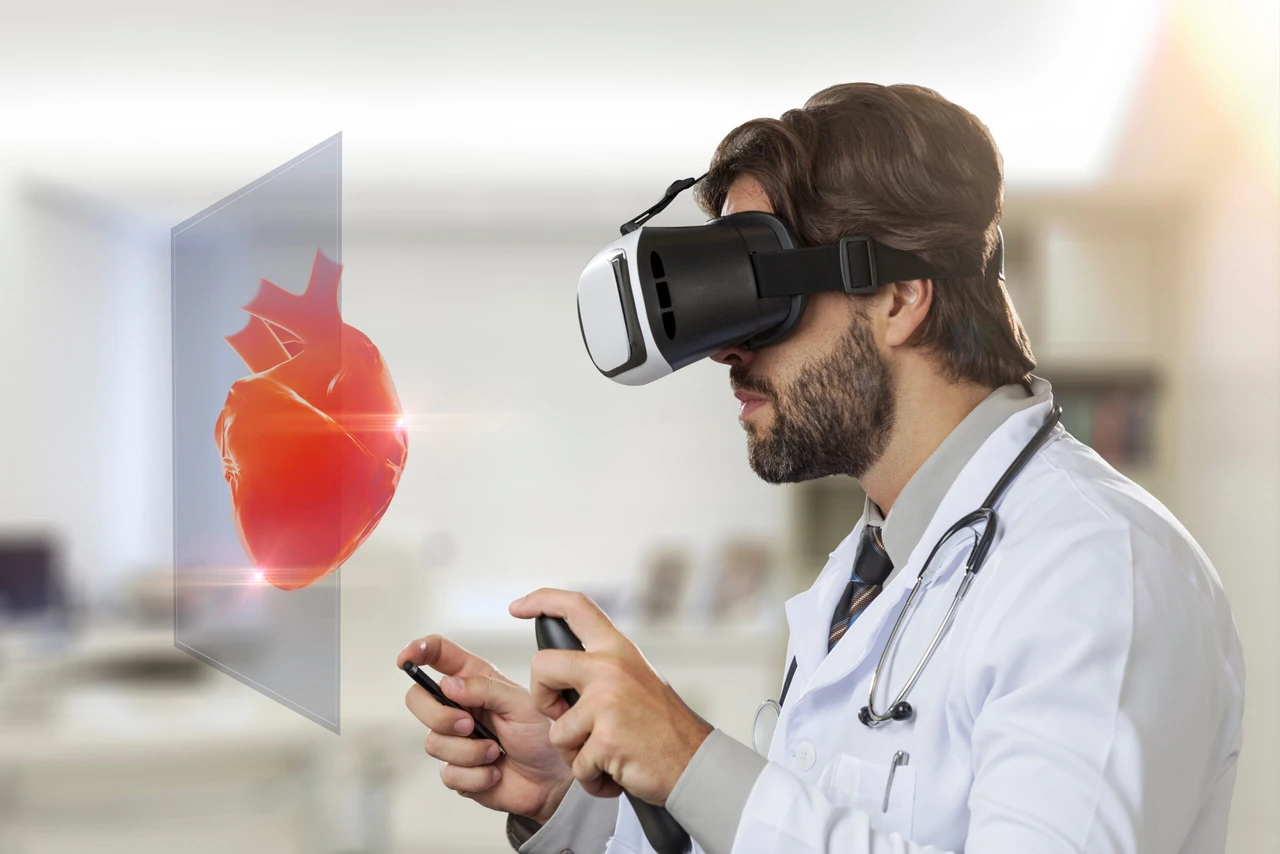 Male doctor wearing virtual reality glasses, examining a virtual heart in his office.