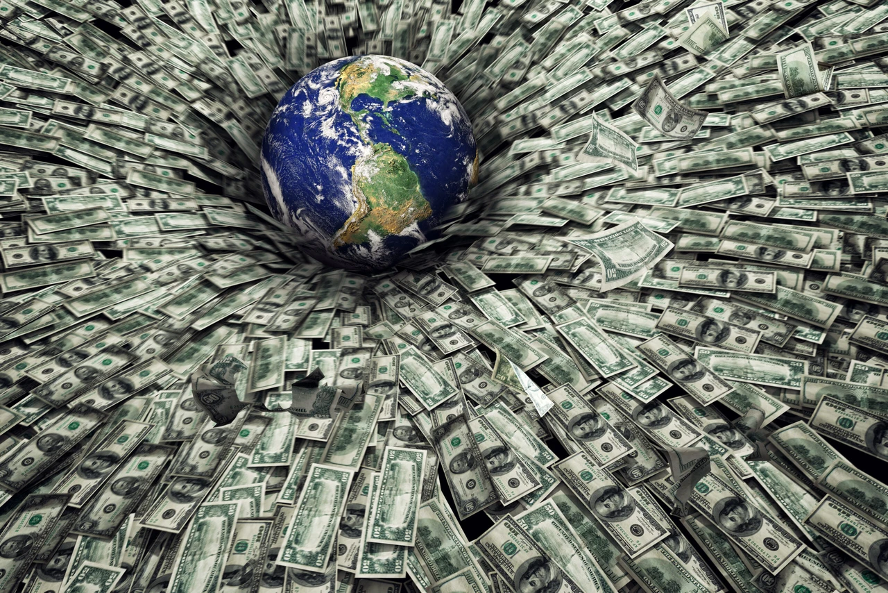 An artistic digital illustration of planet Earth surrounded by a whirlpool of U.S. dollar bills