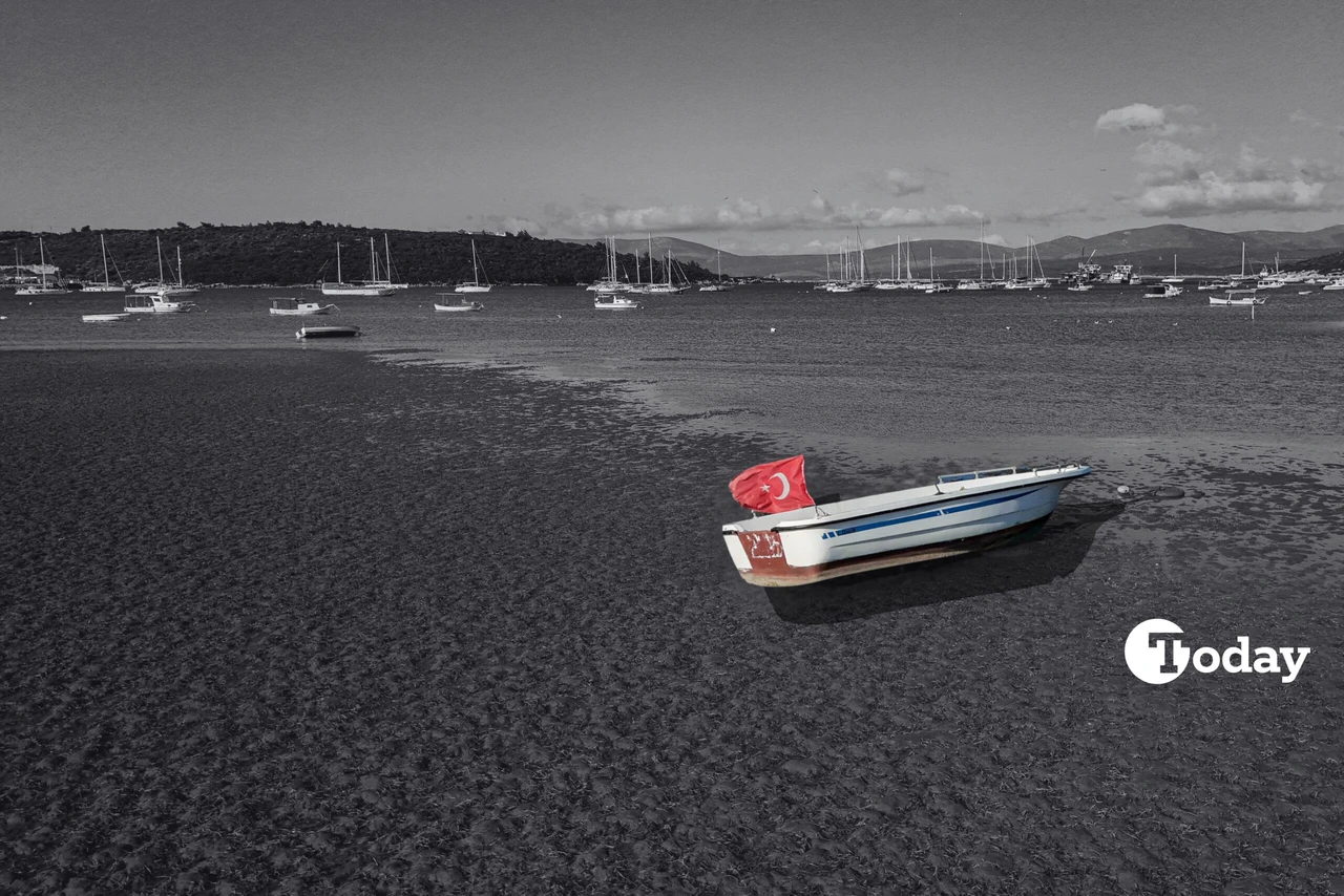 Fishing boats stranded on land due to the sea's retreat in Seferihisar, Izmir.