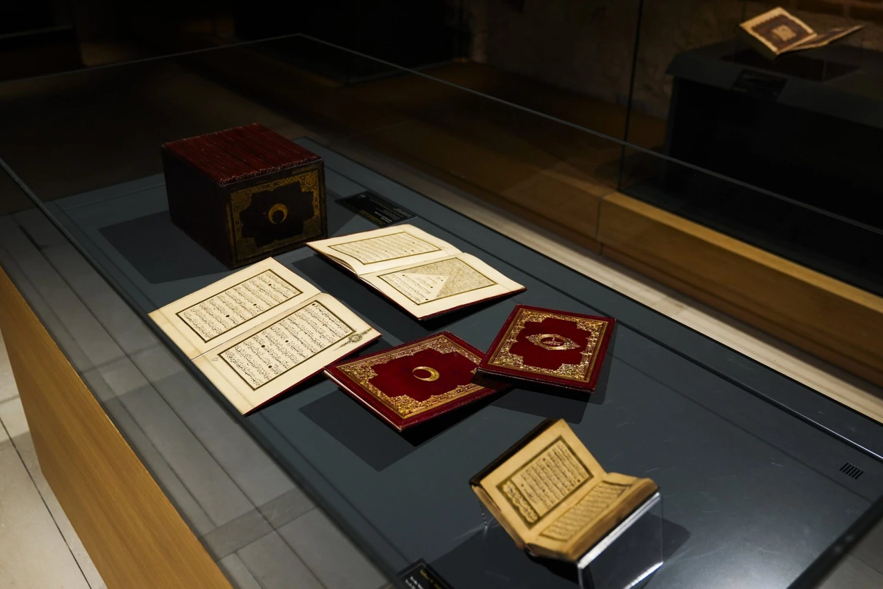 A selection of historical Mushafs exhibited at the "Mushafs of the Sultans" event at Rami Library, Istanbul, Türkiye.