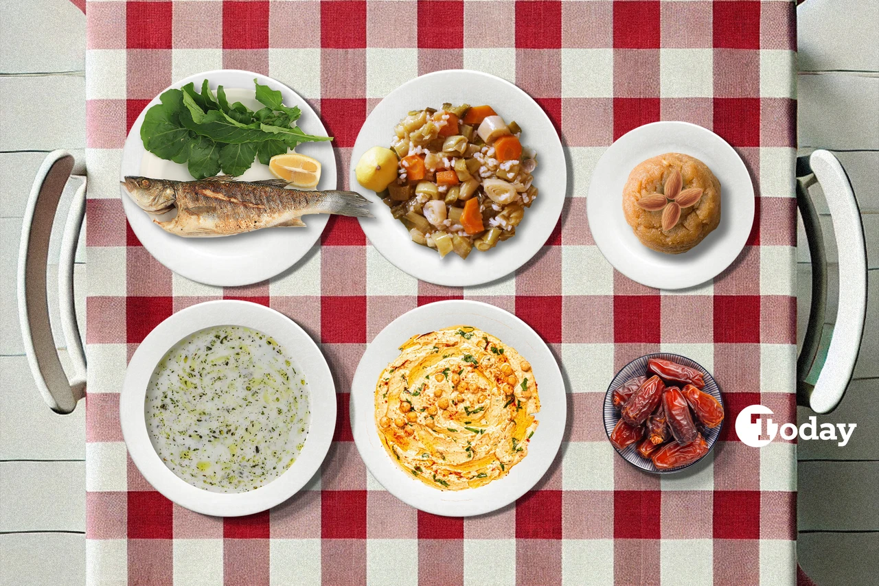 A well-prepared iftar table with grilled fish, garlic yogurt soup, hummus, olive oil-braised leeks, and semolina halva, showcasing a balanced Turkish meal.