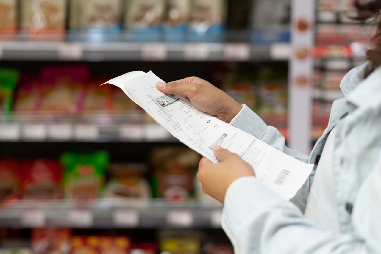 Women customer checking product bills after shopping