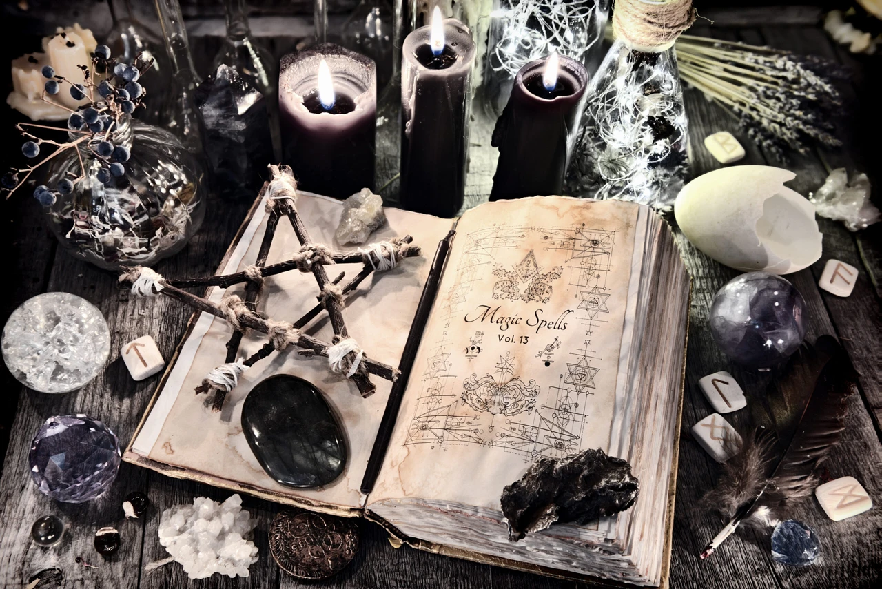 An open spellbook labeled "Magic Spells Vol. 13" surrounded by candles, crystals, a pentagram made of twigs, and mystical objects on a wooden table, evoking a witchcraft and spiritual ritual setting.