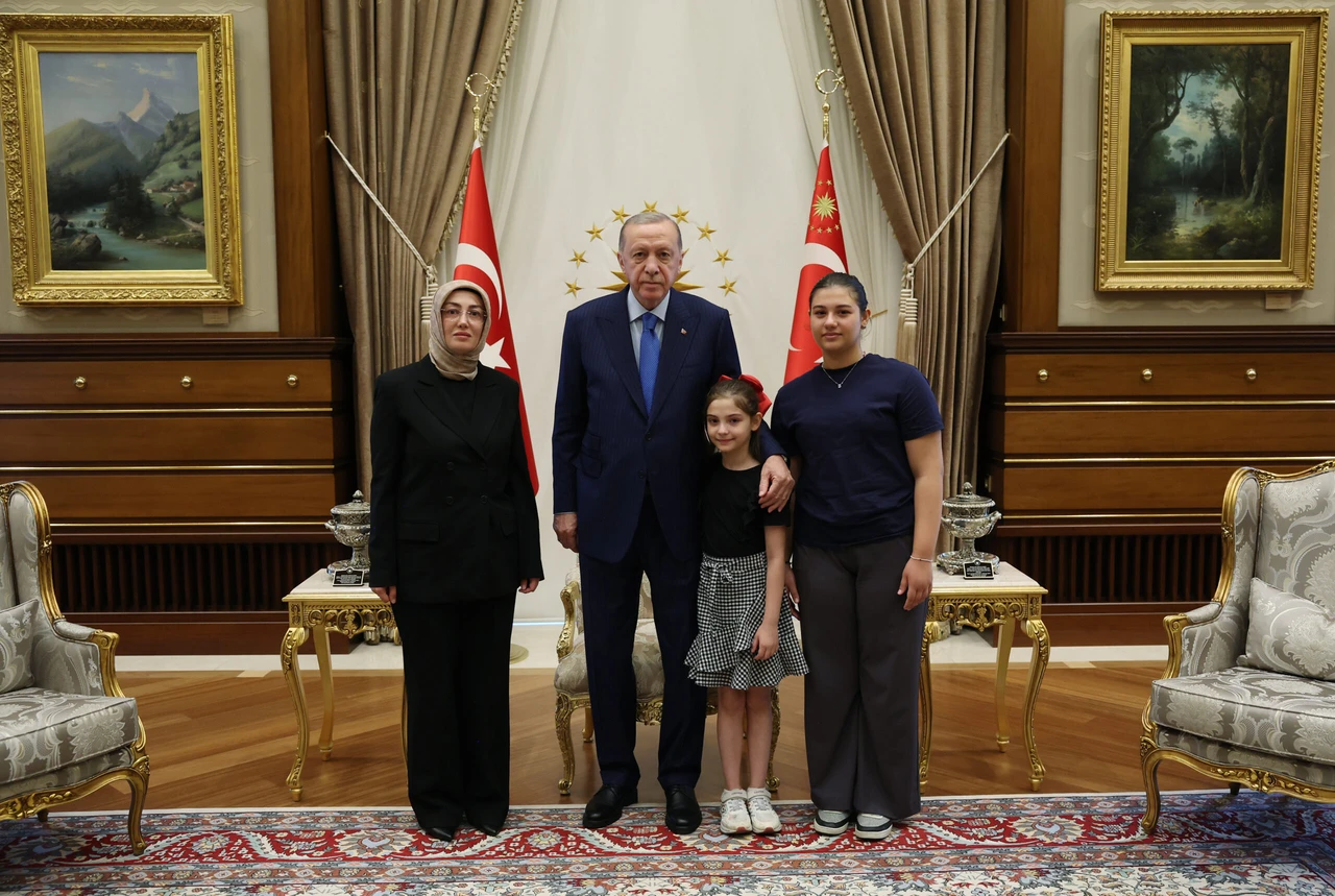 President Erdogan meets with widow and daughters of slain nationalist figure