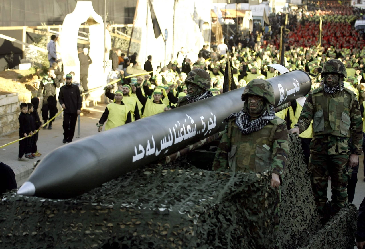 Hezbollah fires missile at Mossad HQ for first time as Israeli airstrikes escalate