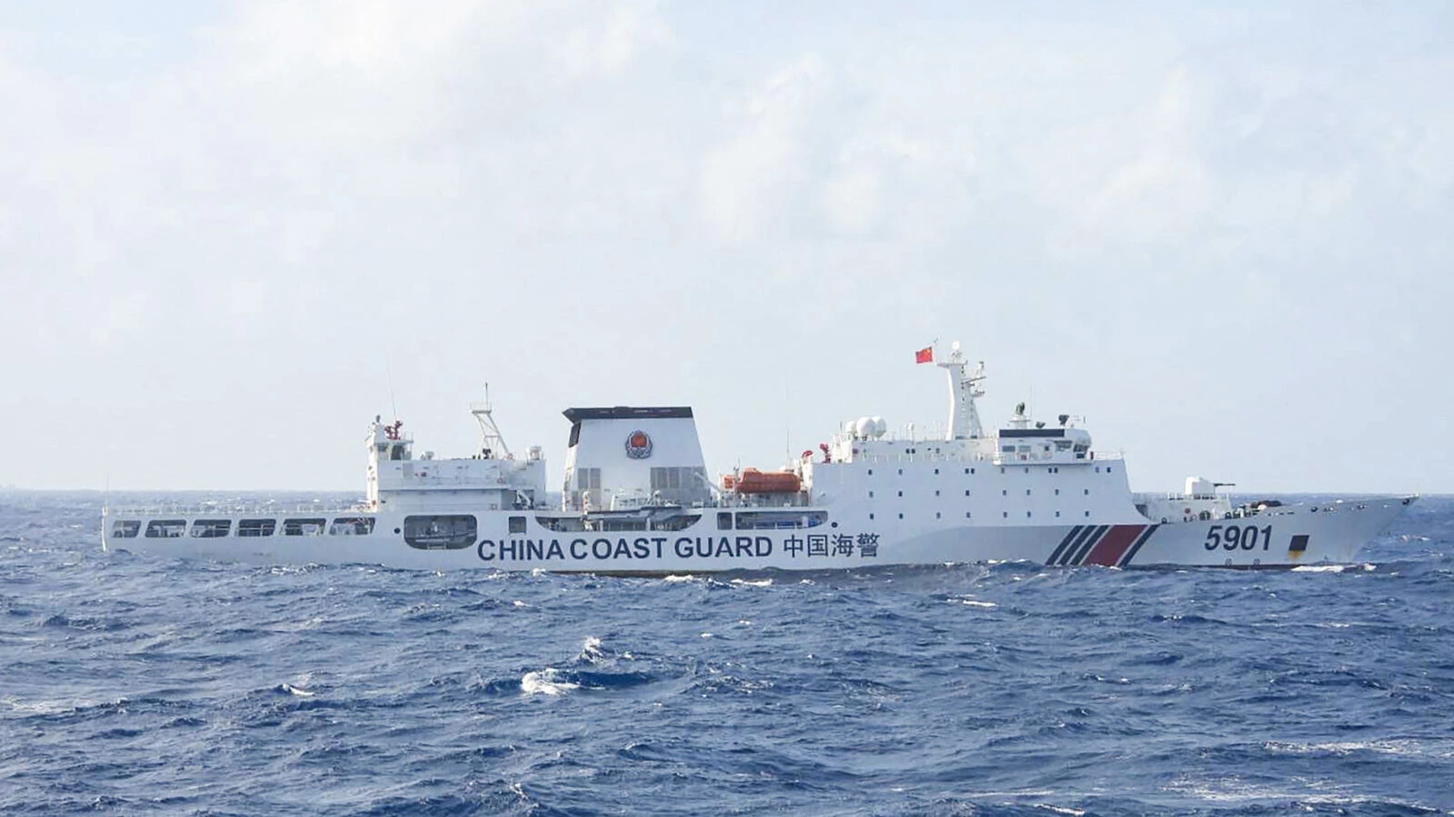 China Raises Flag at Sandy Cay, Tensions Escalate