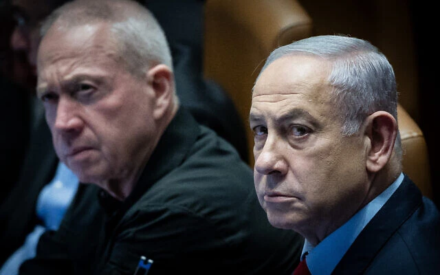 Prime Minister Benjamin Netanyahu, right, and then-Defense Minister Yoav Gallant