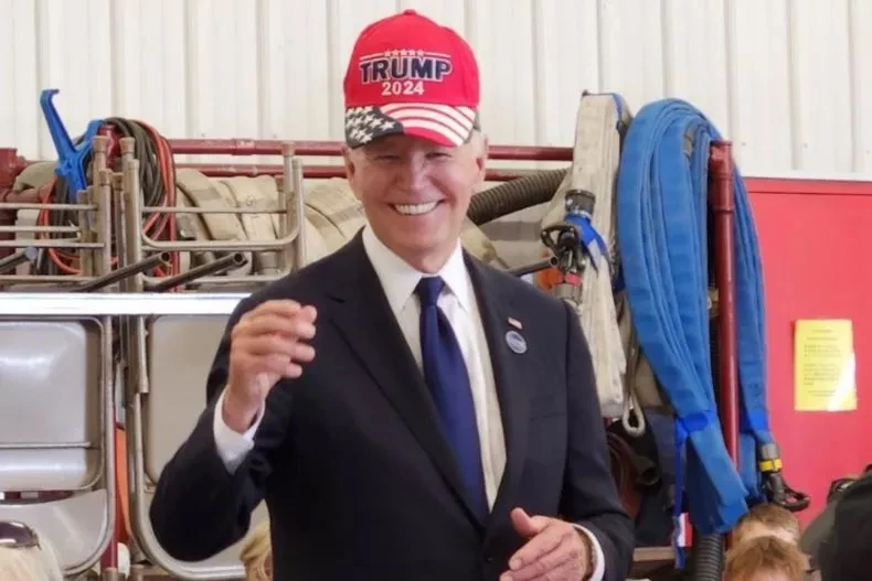 US President Joe Biden wears ‘Trump 2024’ hat