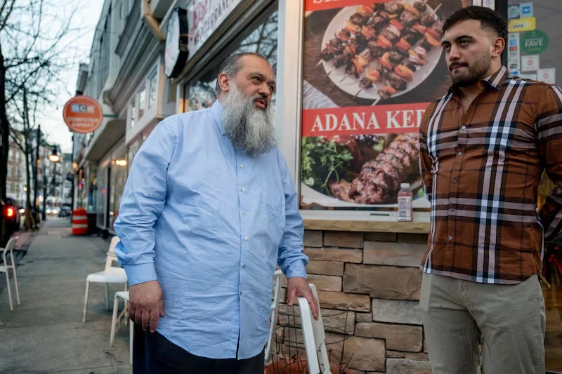 Celal Emanet and his son, Muhammed Emanet, outside the Jersey Kebab restaurant in Haddon Township.