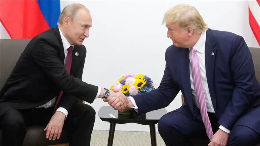 Donald Trump and Vladimir Putin seen together during a meeting.