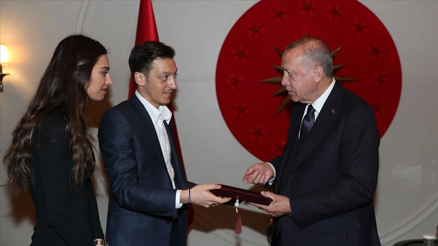 President Erdogan meets footballer Mesut Ozil, along with Ozil and his fiancée Amine Gulse