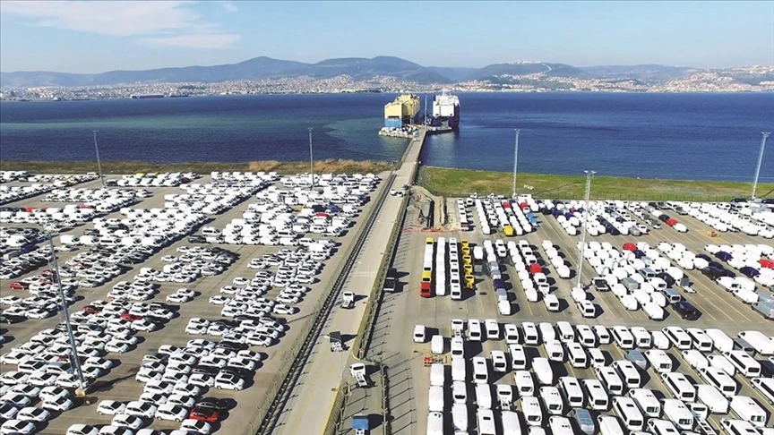 Aerial view shows hundreds of newly manufactured vehicles lined up in rows