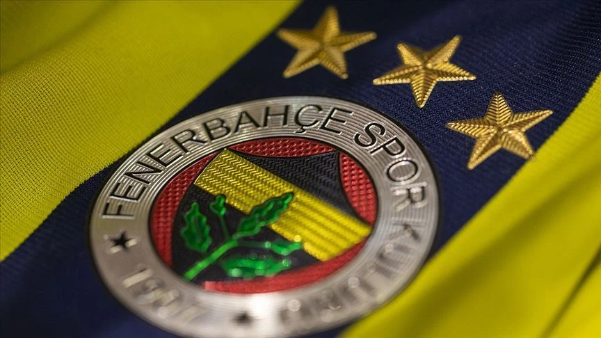 Fenerbahce emblem on the team's iconic yellow and navy blue jersey