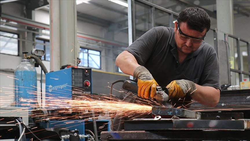 A Turkish worker at a manufacturing facility
