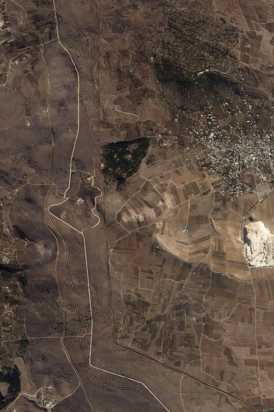 Satellite images show Israel building a road in demilitarized zone in Syria