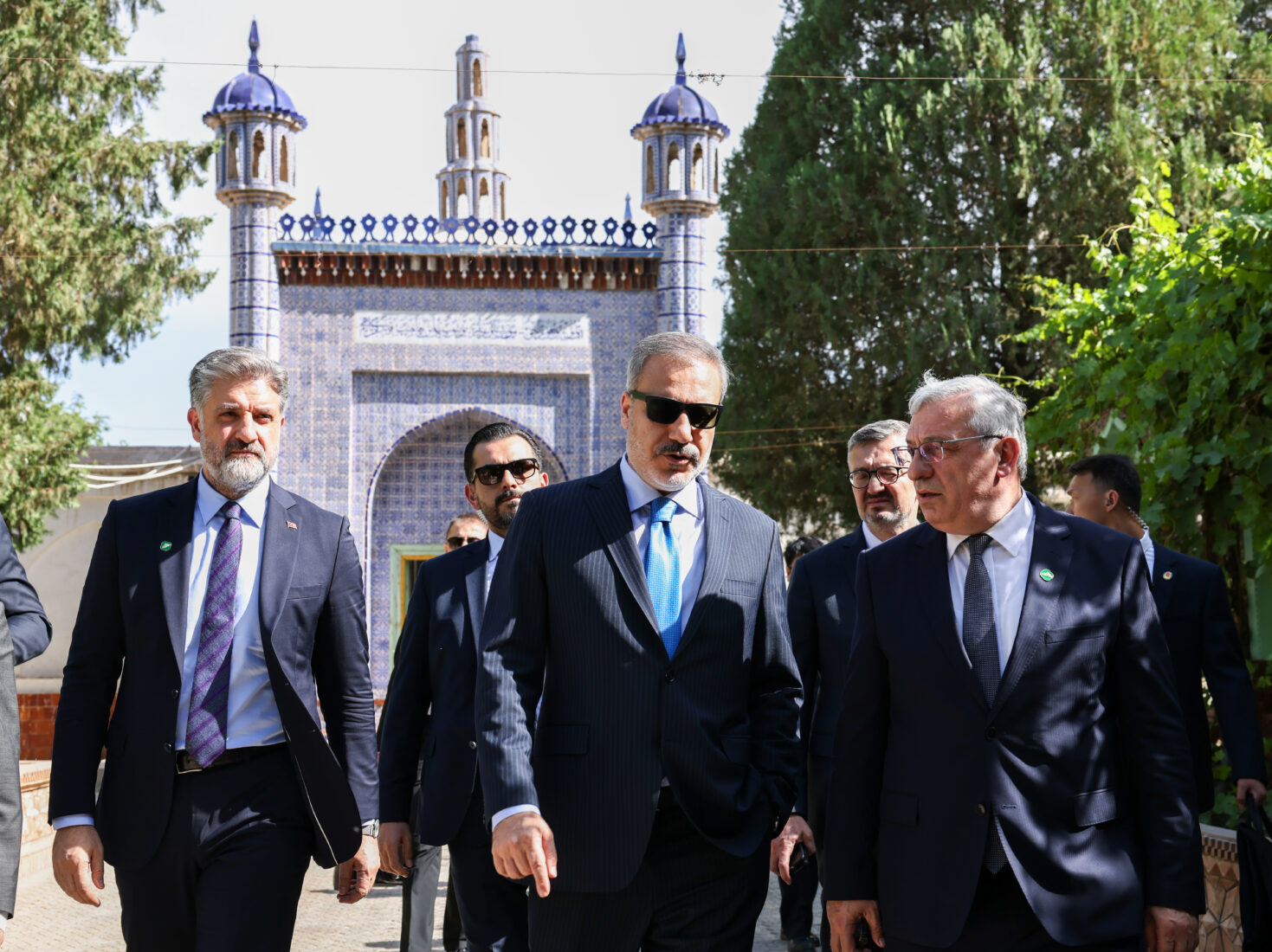 How did the world see FM Fidan's visits to Xinjiang and Kashgar?