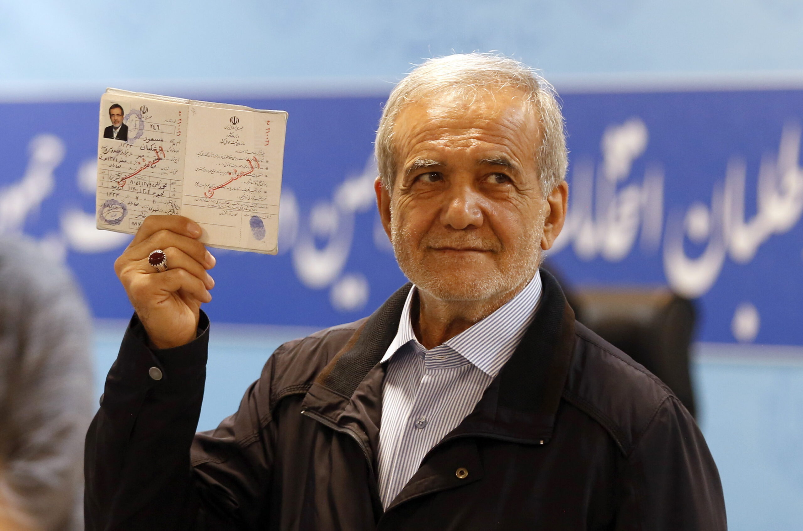 Masoud Pezeshkian with his identification document while registering as a candidate for the June 28 presidential election, Tehran, June 13, 2024, Associated Press