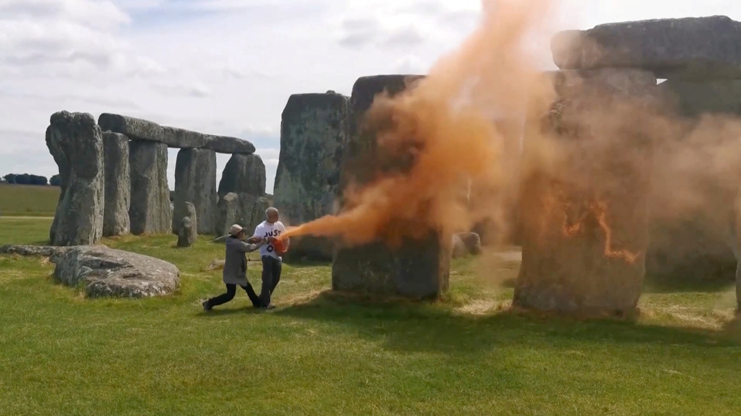 Orange paint protest at Stonehenge leads to arrests