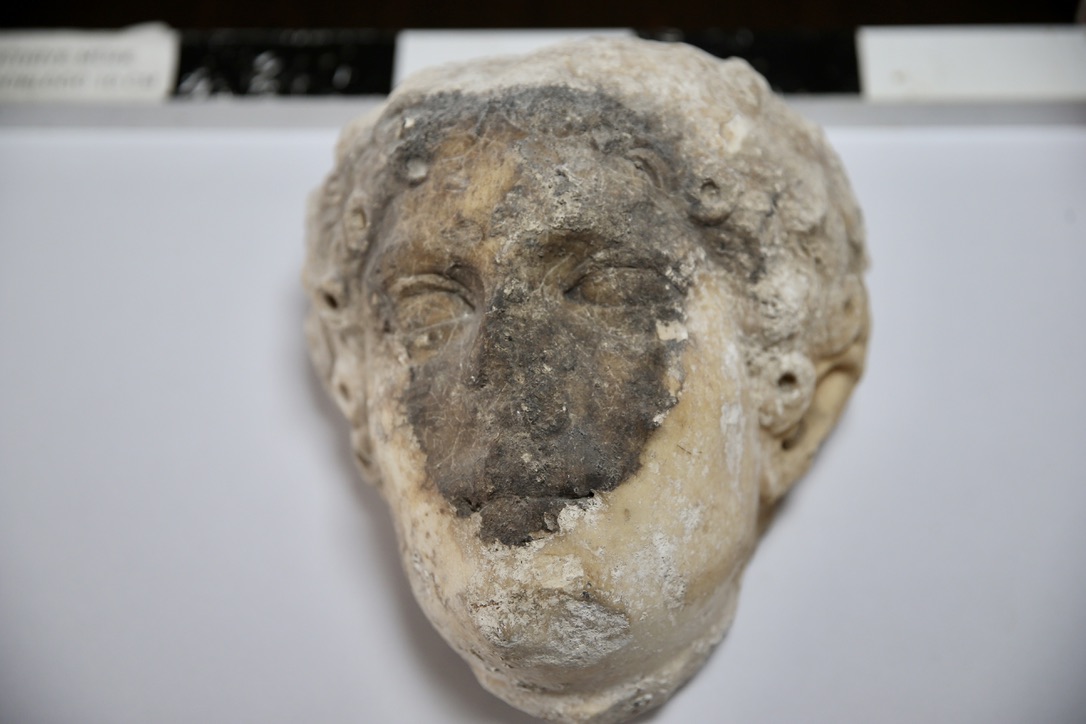 Ancient Greek god’s head found peeping out of Fethiye Castle