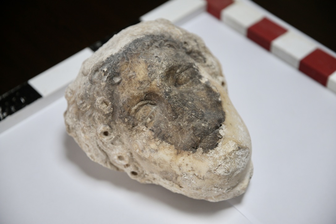 Ancient Greek god’s head found peeping out of Fethiye Castle