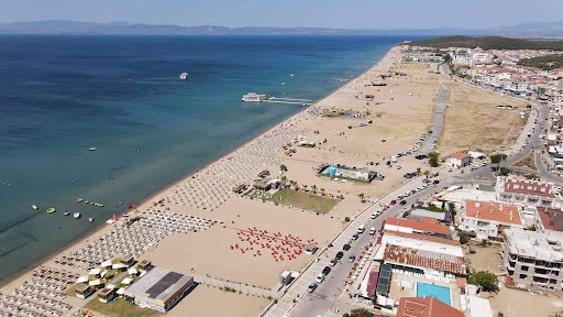 Enjoy the long, clean shores and refreshing waters of Sarimsakli Beach, a top destination in Ayvalik. 