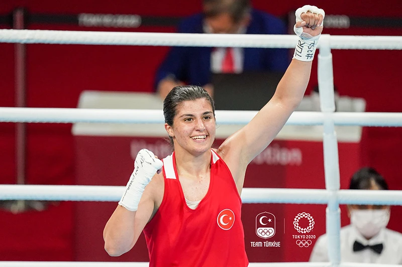 Turkish boxer Busenaz Surmeneli celebrates rising her left fist