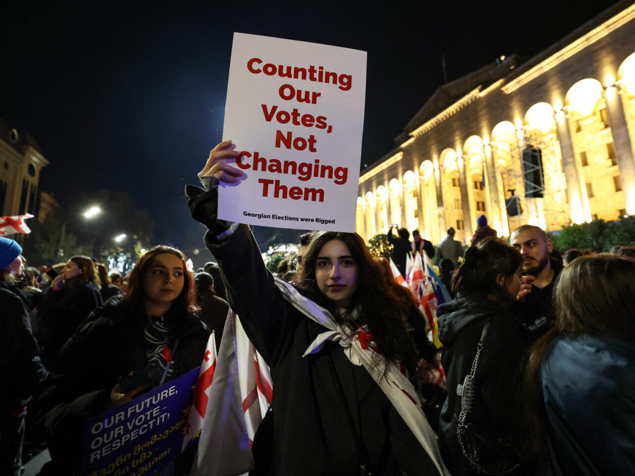 Georgia's ruling party opens parliamentary session amid protests, opposition boycotts