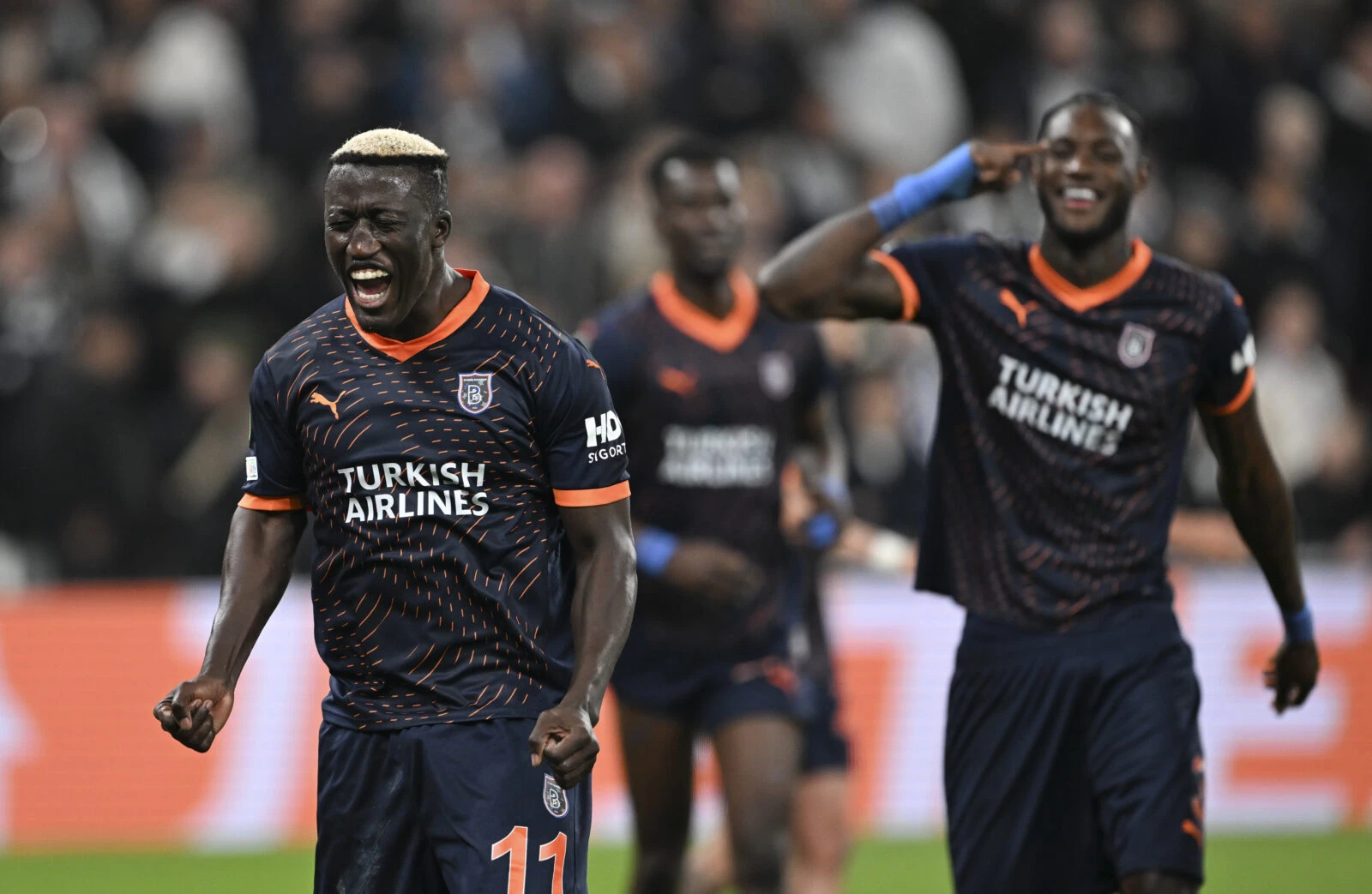 Two Basaksehir players celebrate