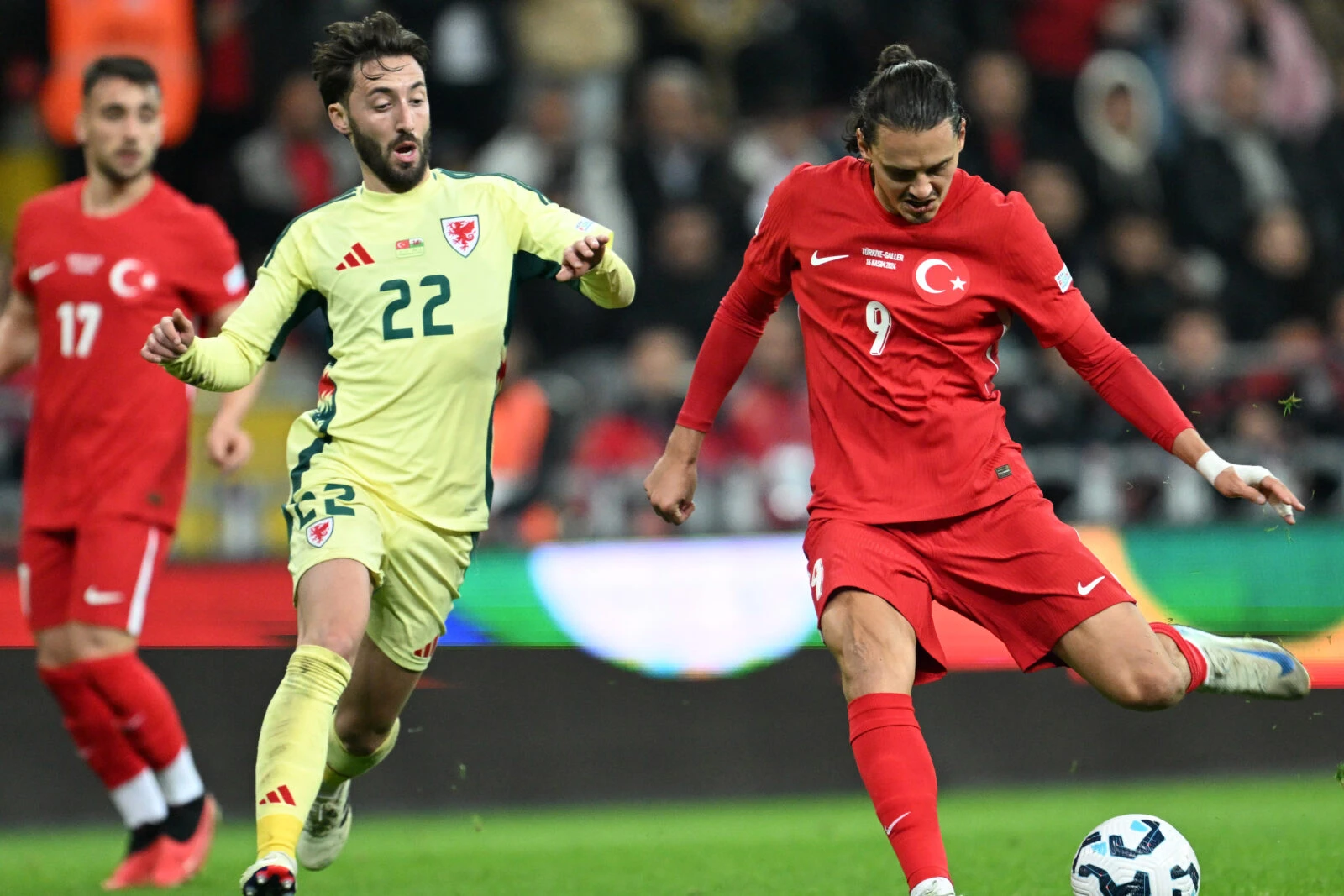 Enes Unal of Türkiye in action against Joshua Sheehan