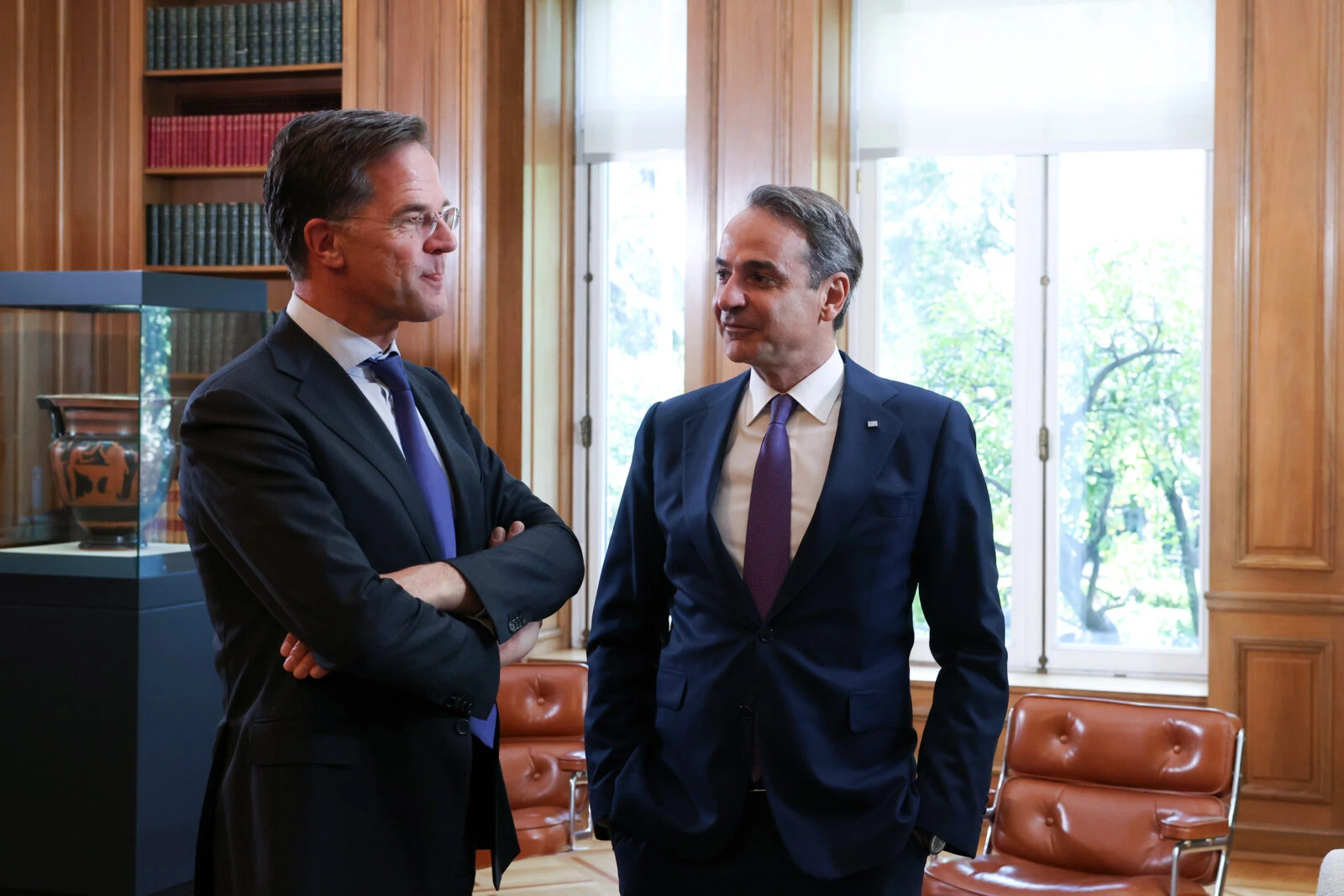 Greek Prime Minister Kyriakos Mitsotakis (R) meets with Secretary General of NATO Mark Rutte (L) 