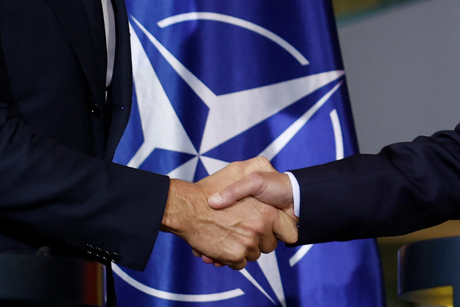 Two leaders shake hands during a press conference in Berlin on Nov. 4, 2024