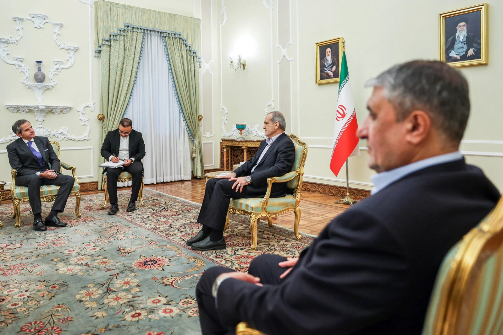 photo shows iranian nuclear chief and ministers